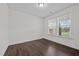Bright office features hardwood floors and a large window with a view at 135 Glenfield Ln, Burlington, NC 27215