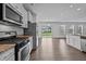 Modern kitchen with stainless steel appliances and granite countertops at 135 Glenfield Ln, Burlington, NC 27215