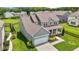 Two-story house, gray siding, white garage door, and spacious backyard at 135 Glenfield Ln, Burlington, NC 27215