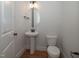 Powder room with pedestal sink and toilet at 16 Autumn Breeze Ct, Angier, NC 27501