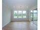 Bright dining room with hardwood floors and large windows at 16 Autumn Breeze Ct, Angier, NC 27501