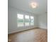 Spacious bedroom with hardwood floors and backyard views at 16 Autumn Breeze Ct, Angier, NC 27501