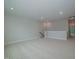 Spacious bonus room with neutral carpeting and recessed lighting at 16 Autumn Breeze Ct, Angier, NC 27501