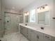 Modern bathroom with double vanity and walk-in shower at 16 Autumn Breeze Ct, Angier, NC 27501