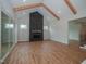Gathering room featuring sliding glass doors and a stunning fireplace at 16 Autumn Breeze Ct, Angier, NC 27501