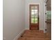 Bright entry with hardwood floors and a wood door at 16 Autumn Breeze Ct, Angier, NC 27501