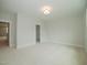 Spacious bedroom with carpet, light walls, and a closet at 16 Autumn Breeze Ct, Angier, NC 27501