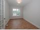 Bright office with hardwood floors and a view of the neighborhood at 16 Autumn Breeze Ct, Angier, NC 27501