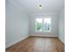Spacious office with hardwood floors and a view of the neighborhood at 16 Autumn Breeze Ct, Angier, NC 27501