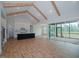 Modern kitchen with white cabinets, island, and open concept to living room at 16 Autumn Breeze Ct, Angier, NC 27501