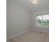 Bedroom with carpeted floors and a large window at 16 Autumn Breeze Ct, Angier, NC 27501