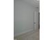 Spacious bedroom with carpeted floors and a door at 16 Autumn Breeze Ct, Angier, NC 27501