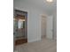 Bedroom with carpet, access to bathroom and closet at 16 Autumn Breeze Ct, Angier, NC 27501