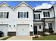 Two-story home with white siding and black accents at 156 S Mistflower St, Clayton, NC 27520
