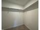 Spacious closet with ample shelving for storage at 1220 Porters Call Dr, Wendell, NC 27591