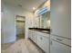 Elegant bathroom with double vanity and marble floors at 1220 Porters Call Dr, Wendell, NC 27591