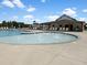 Resort-style pool with a separate kiddie pool and plenty of lounge chairs at 1220 Porters Call Dr, Wendell, NC 27591