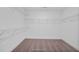 Walk-in closet with wire shelving providing ample storage space at 81 Eagle Crest Ct # Apex Craftsman, Lillington, NC 27546