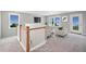 Open loft area with plenty of natural light and access to balcony at 81 Eagle Crest Ct # Apex Craftsman, Lillington, NC 27546
