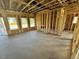 Under construction living room with large windows at 81 Eagle Crest Ct # Apex Craftsman, Lillington, NC 27546