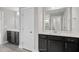 Double vanity bathroom with modern dark brown cabinets and white countertop at 81 Eagle Crest Ct # Apex Craftsman, Lillington, NC 27546