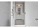 Open door reveals a bright entryway with patterned tile floor and modern door at 81 Eagle Crest Ct # Apex Craftsman, Lillington, NC 27546