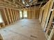 Unfinished bedroom with wood flooring and window at 81 Eagle Crest Ct # Apex Craftsman, Lillington, NC 27546