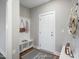 Bright entry with bench, coat hooks, and built-in storage at 81 Eagle Crest Ct # Apex Craftsman, Lillington, NC 27546