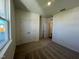 Spacious bedroom with carpet, double door closet and window at 150 Chestnut Oak Ln, Lillington, NC 27546