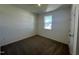 Bright and airy bedroom with carpeted floor and neutral walls at 150 Chestnut Oak Ln, Lillington, NC 27546