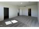 Spacious bedroom with carpet, walk-in closet, and access to bathroom at 150 Chestnut Oak Ln, Lillington, NC 27546