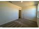 Bright bedroom with carpet flooring and an exterior door at 150 Chestnut Oak Ln, Lillington, NC 27546
