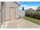 Small concrete patio adjacent to home at 6418 Swatner Dr, Raleigh, NC 27612