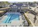 Resort-style pool with ample lounge chairs and seating at 353 Village Walk Dr, Clayton, NC 27527