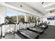 Modern gym with cardio and strength training equipment at 353 Village Walk Dr, Clayton, NC 27527