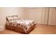 Bedroom with a double bed, palm tree bedding, and built-in wardrobe at 1525 Marshburn Rd, Wendell, NC 27591