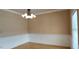 Simple dining room with light walls and wood flooring at 1525 Marshburn Rd, Wendell, NC 27591