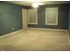 Spacious bedroom with neutral walls and carpet flooring at 1525 Marshburn Rd, Wendell, NC 27591
