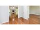 Hardwood floors and an open view into the living room at 8246 Us-401, Fuquay Varina, NC 27526