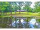 Ranch home on a large lot with a pond in the front at 8246 Us-401, Fuquay Varina, NC 27526