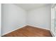 Bright bedroom with hardwood floors and large window at 8246 Us-401, Fuquay Varina, NC 27526