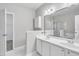 Double vanity bathroom with a separate shower and tub at 333 Glenolden Ct, Cary, NC 27513