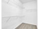 Walk-in closet with wire shelving at 333 Glenolden Ct, Cary, NC 27513