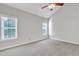Well-lit bedroom with vaulted ceiling and ceiling fan at 333 Glenolden Ct, Cary, NC 27513