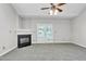Bright living room featuring a fireplace and access to a balcony at 333 Glenolden Ct, Cary, NC 27513