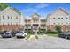 Exterior view of a brick and beige apartment building at 333 Glenolden Ct, Cary, NC 27513