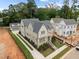 Aerial view of charming two-story house with detached garage at 2646 Marchmont St, Raleigh, NC 27608