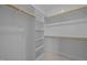Bright walk-in closet with shelves and hanging space at 2646 Marchmont St, Raleigh, NC 27608