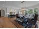 Elegant dining area adjacent to the kitchen with stylish furniture and rug at 2646 Marchmont St, Raleigh, NC 27608