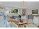 Relaxing game room with comfortable seating and large windows at 2646 Marchmont St, Raleigh, NC 27608